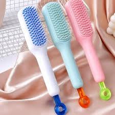 Fuxin - Self Cleaning Hair Brush